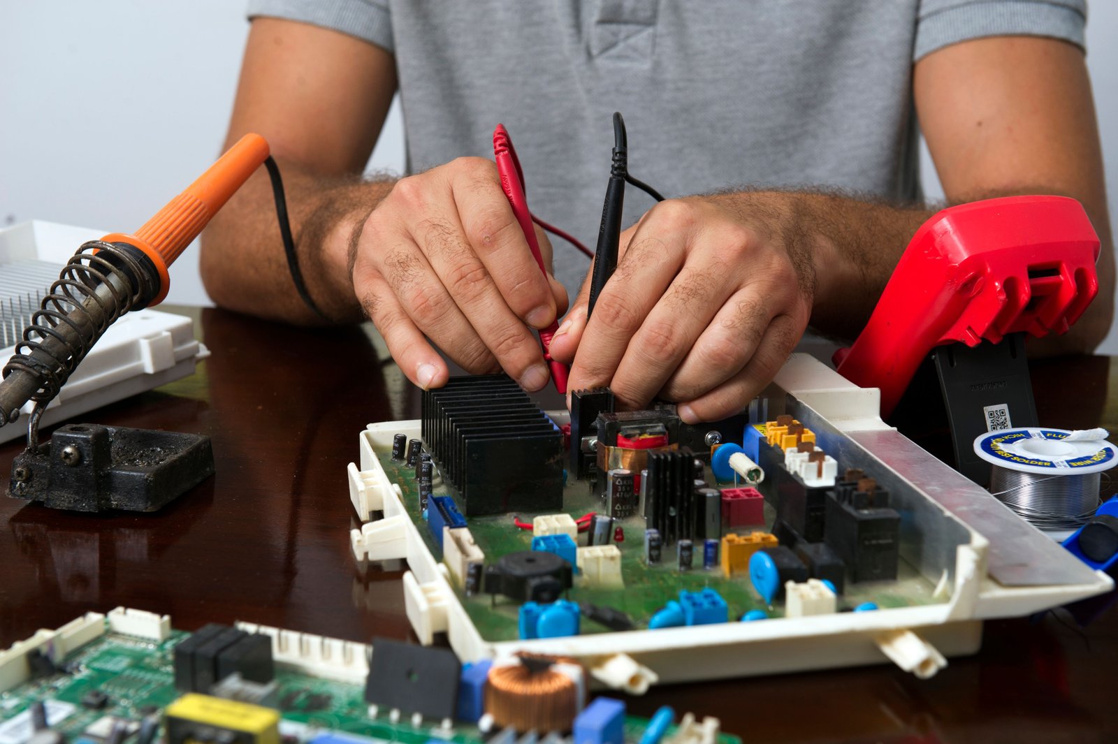 Electronics repair workshop representing consumer repairability and service access