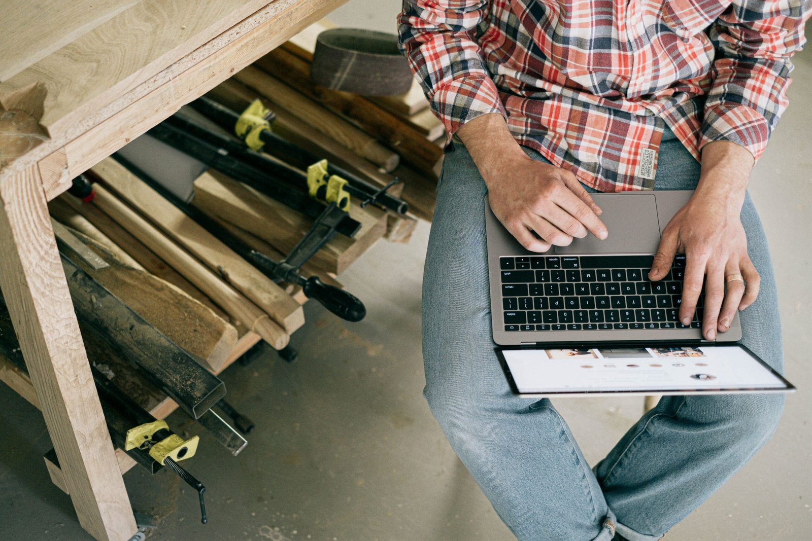 Small business owner using a laptop for AI automation workflows