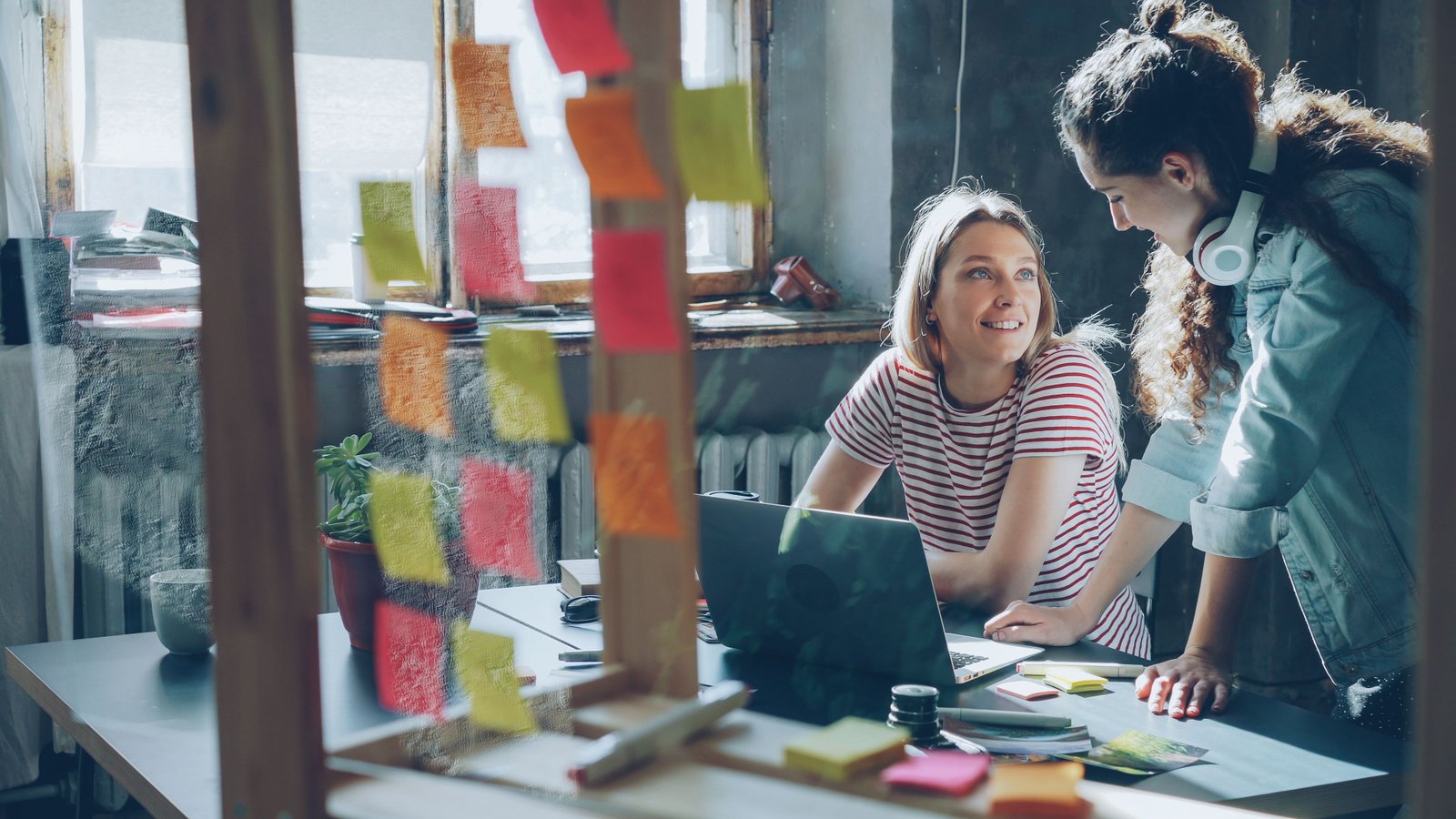 Team collaborating on project tasks and deadlines in an office