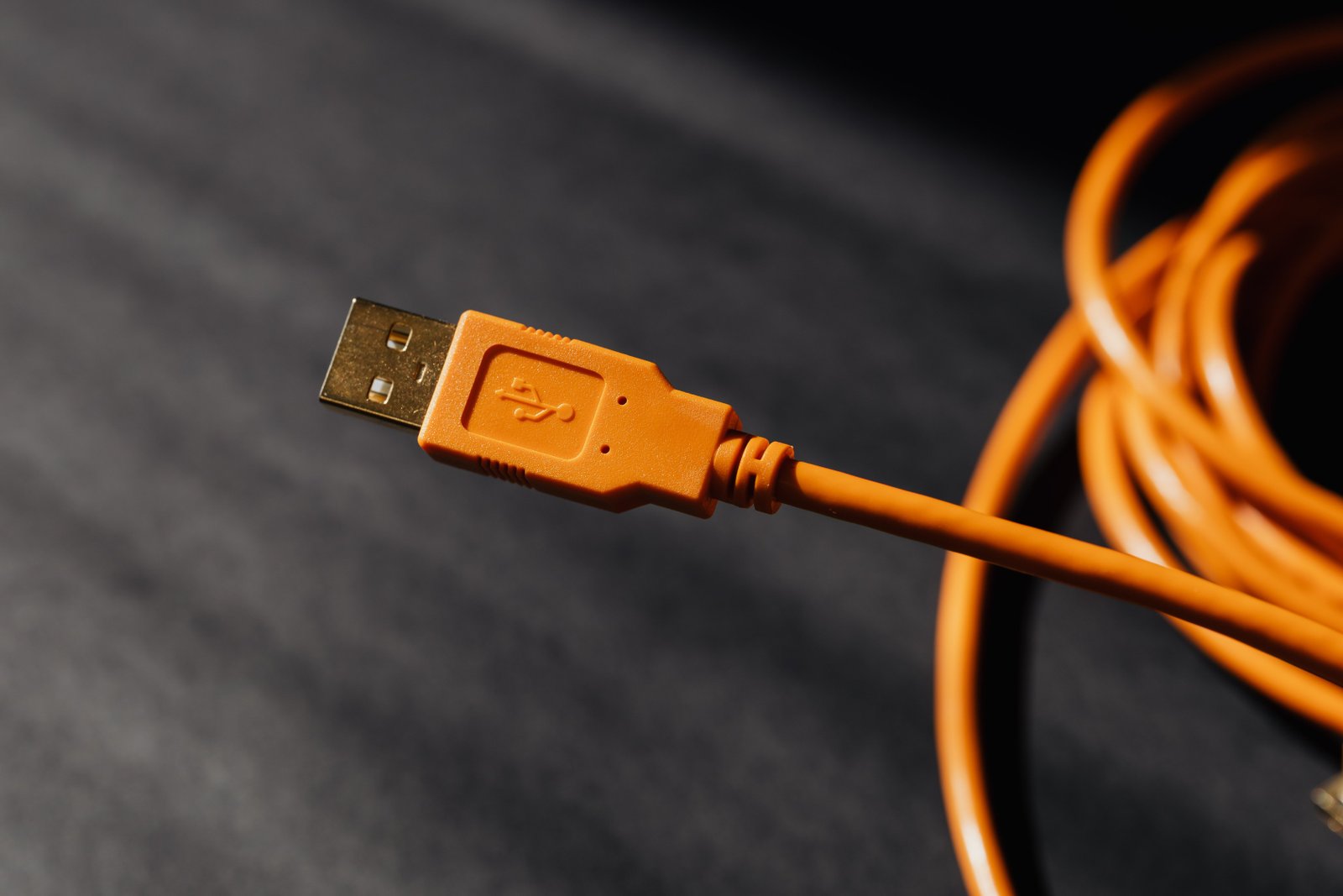 USB-C cable connecting a laptop to an external display