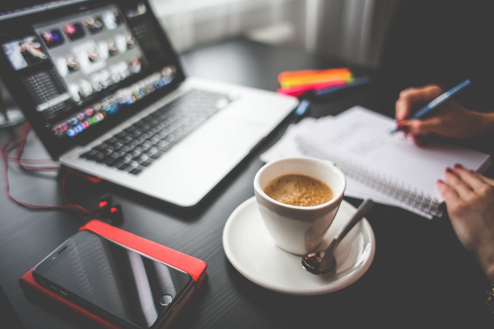 Professional laptop workspace representing a range of AI software tools