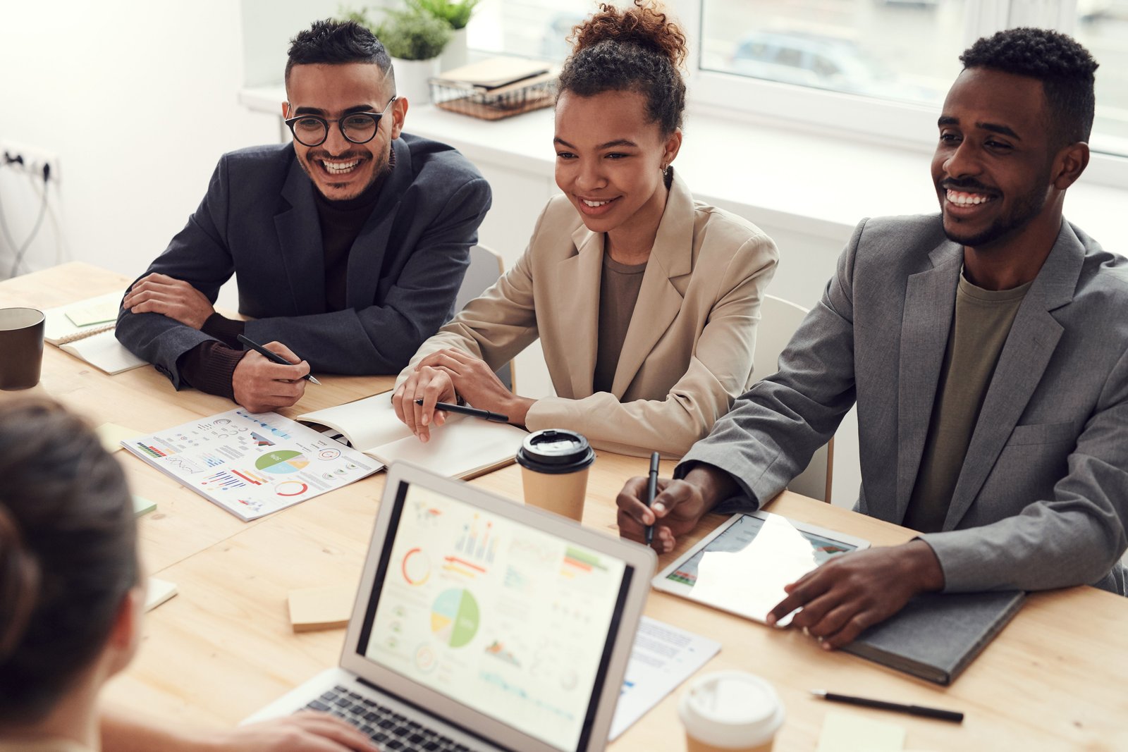 Professional team collaborating on an AI-assisted workflow